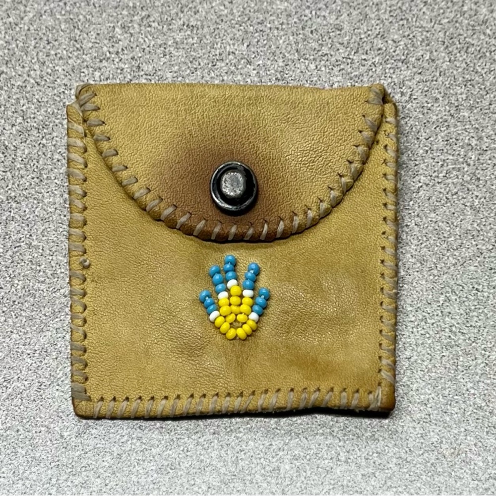 Beaded leather pouch